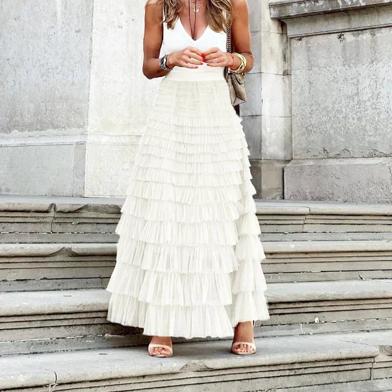 Chic women's long midi skirt with elegant pleats, perfect for stylish versatile fashion outfits.