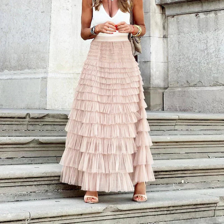 Stylish women's midi skirt, elegant pleated design, ideal for a chic, versatile fashion outfit.