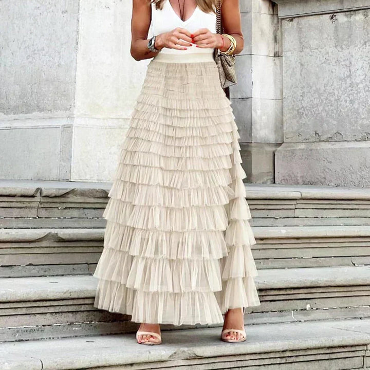 Versatile women's elegant pleated midi skirt, flowy and chic for various fashion ensembles.