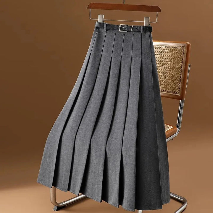 Elegant women's pleated midi skirt, perfect for versatile styling. A timeless piece for any occasion.