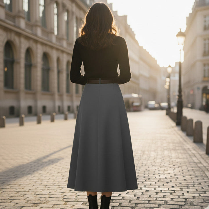 Chic women's pleated midi skirt, offering an elegant & timeless look. Great for versatile fashion.