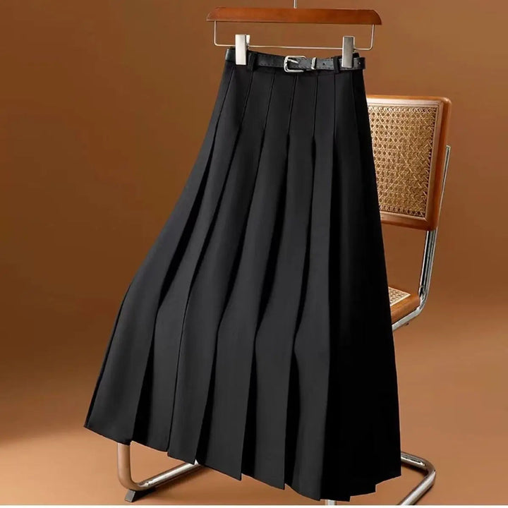 Stylish women's pleated midi skirt. An elegant, versatile choice for both casual and formal outfits.