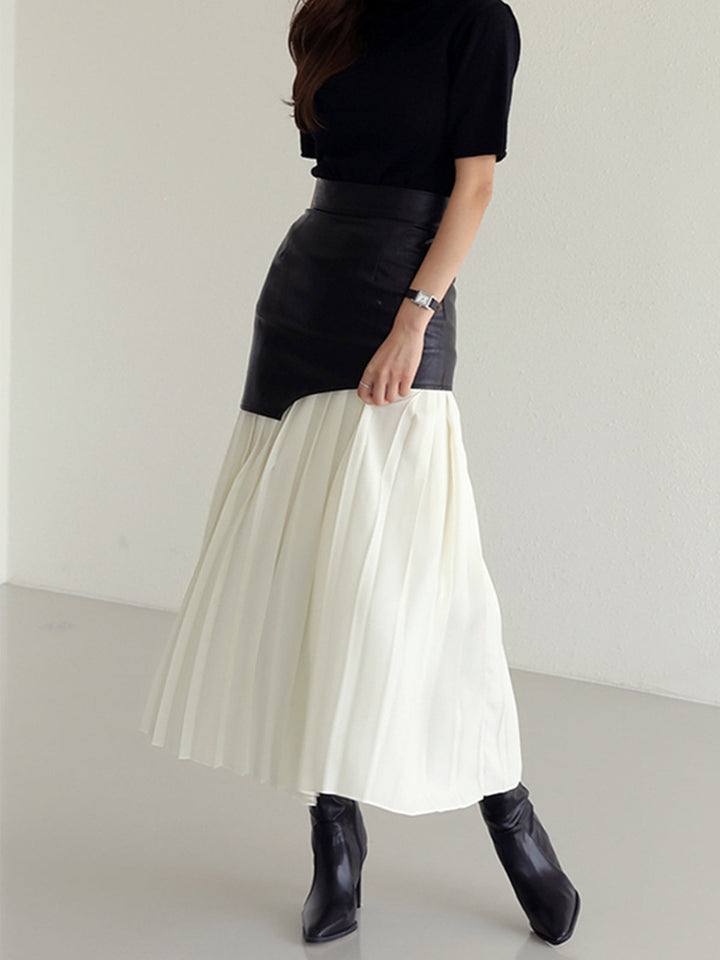 Black high-waisted pleated midi skirt for women, featuring a chic asymmetrical hem. Versatile office wear.
