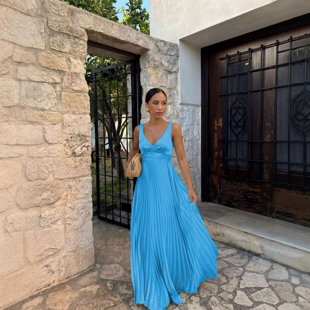 Formal pleated maxi dress for women, featuring a flattering V-neck, suitable for weddings & parties.