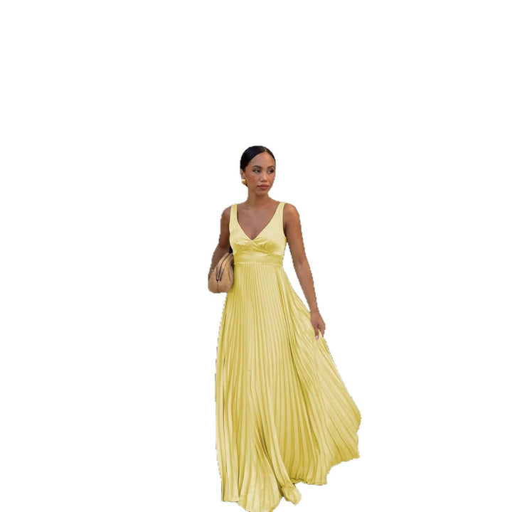 Beautiful women's formal pleated maxi dress, a perfect elegant wedding guest outfit.