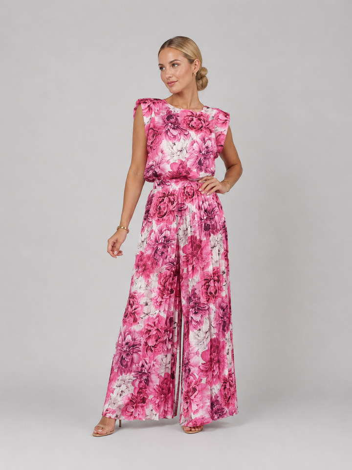 Sophisticated women's two-piece pleated wide-leg trouser set, offering elegant comfort for any occasion.