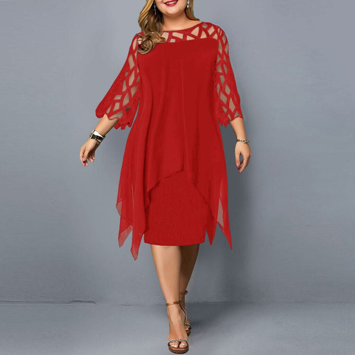 Green plus size party dress with beautiful lace overlay and a trendy asymmetric midi hem.