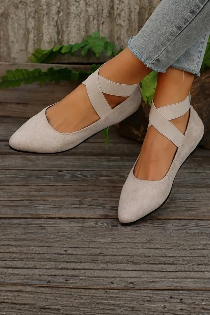 Matte finish women's pointed toe ballet flats with secure ankle strap, ideal for casual elegant style.