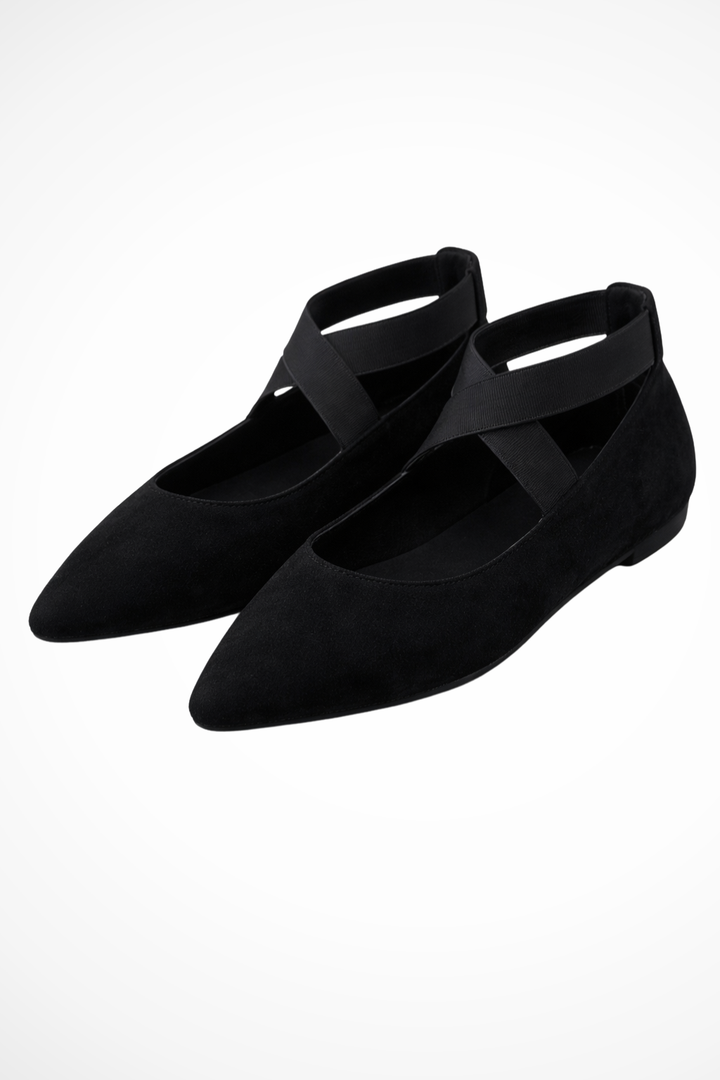Comfortable women's slip-on ballet flats, featuring a chic pointed toe and supportive ankle strap.