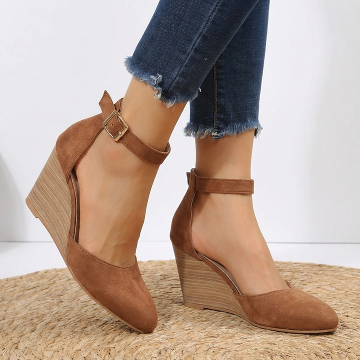 Stylish women's pointed toe ankle strap wedge heels. Elegant and comfortable for office work, parties, and formal events.