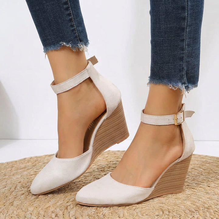 Women's sleek pointed toe wedge heels with delicate ankle strap. Versatile, elegant, and comfortable for formal occasions.