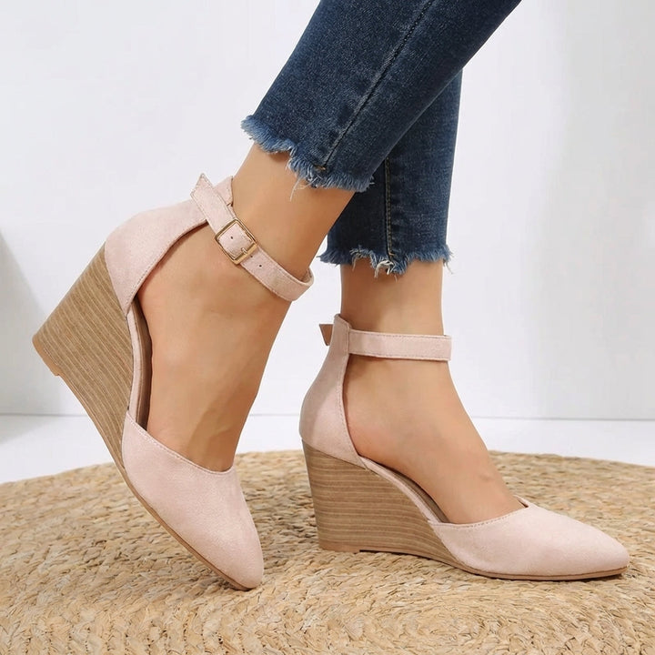 Classic women's pointed toe wedge heels, featuring an elegant ankle strap. Ideal for comfortable formal work or party wear.