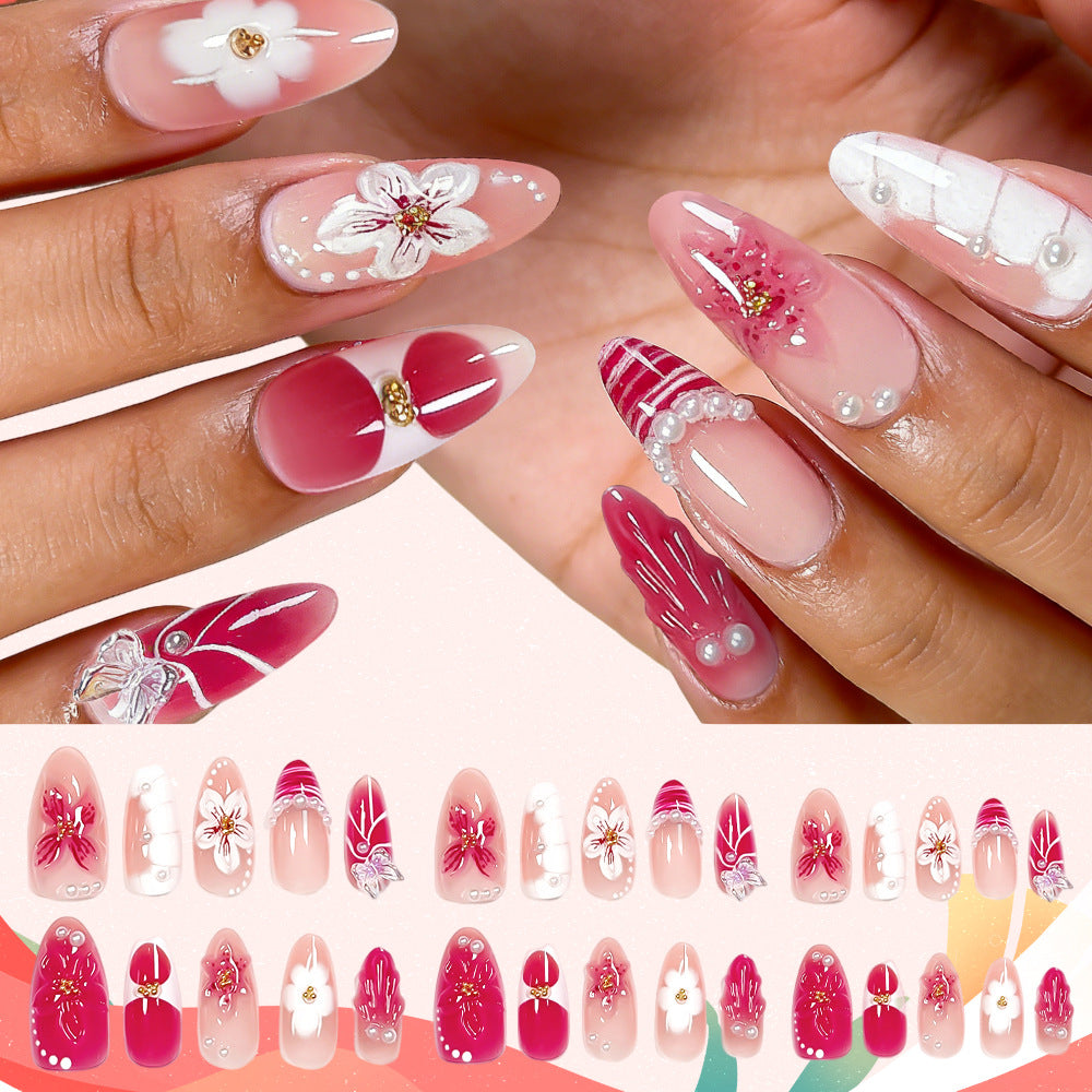 Beautiful floral press-on nails for women, featuring elegant flower art. Instant beauty & stylish false manicure.