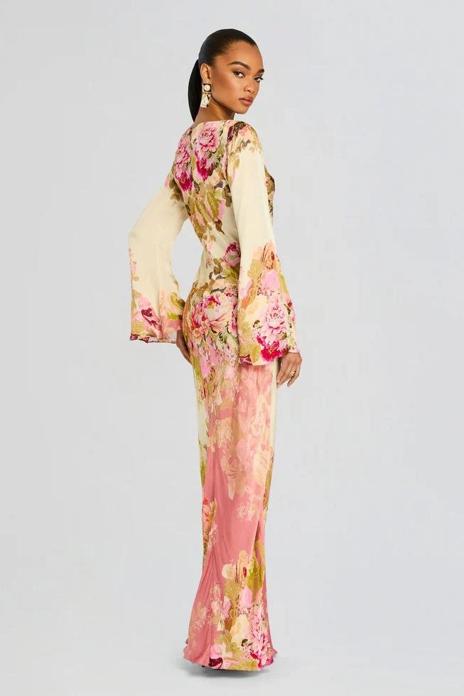 Long women's printed maxi dress featuring a comfortable, effortless flowy design, great for casual or evening wear.