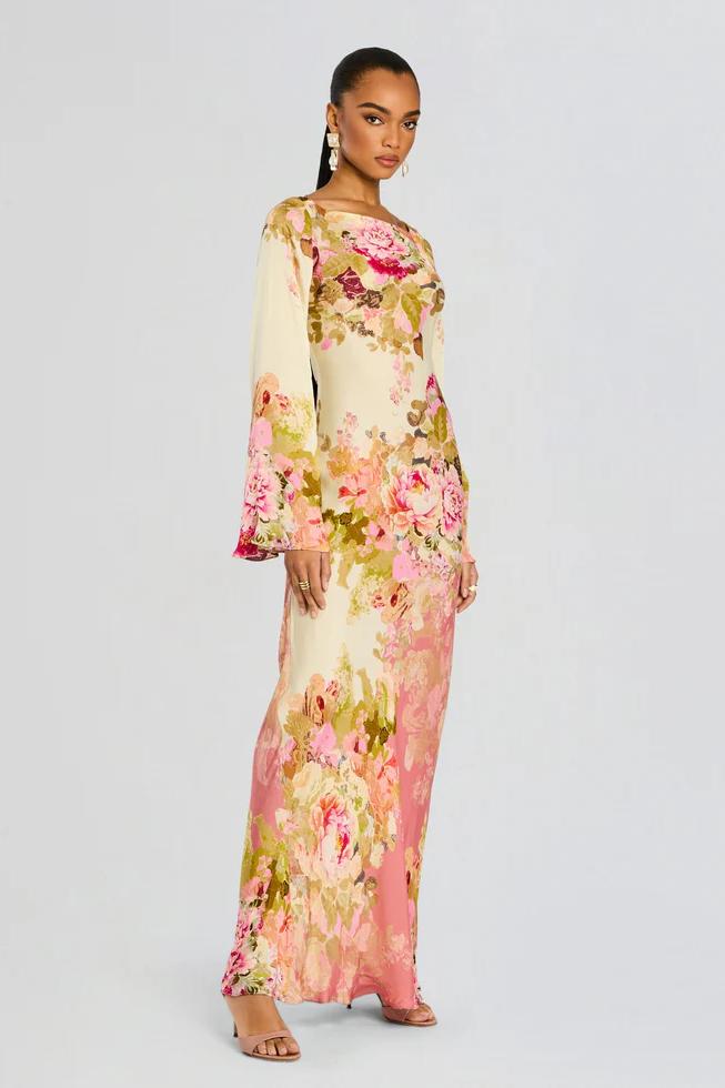 Stylish women's printed maxi dress with a vibrant print, suitable for elegant events, summer parties, or boho style.