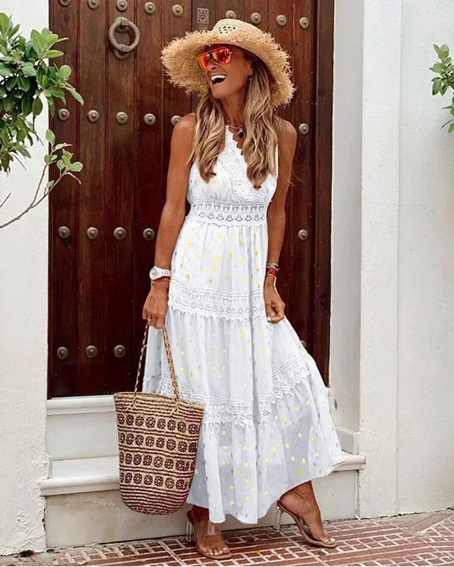 Elegant women's printed maxi dress with a V-neck and sleeveless design, perfect for summer vacations & casual wear.