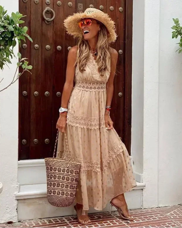 New women's casual printed maxi dress, sleeveless V-neck, flowy A-line cut. Great for summer & spring elegance.