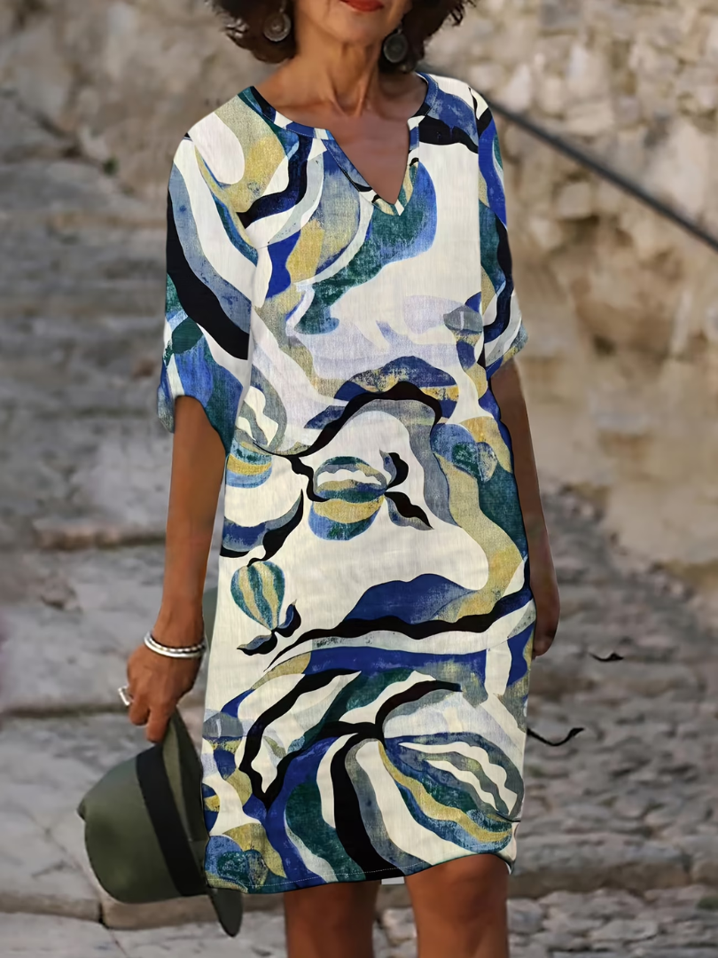 Vibrant printed summer dress for women, perfect for day wear or a casual beach outing.