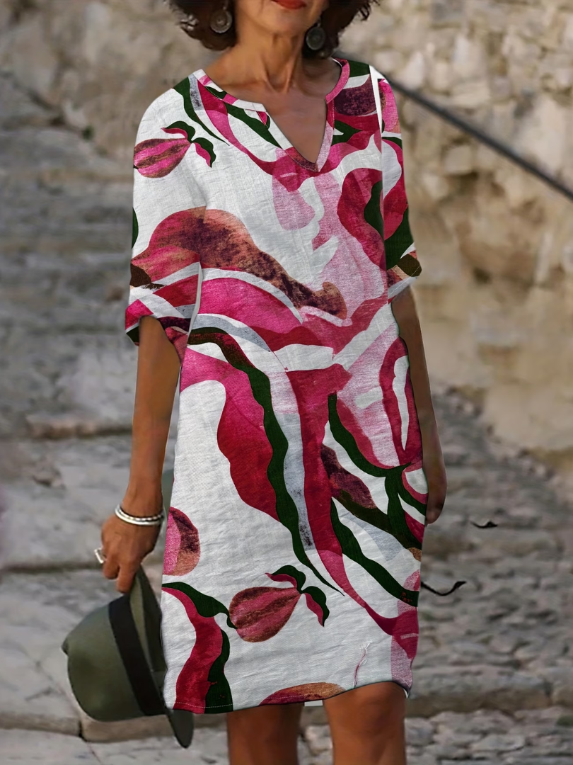 Comfortable, flowy women's summer dress with elegant print, versatile for any day.