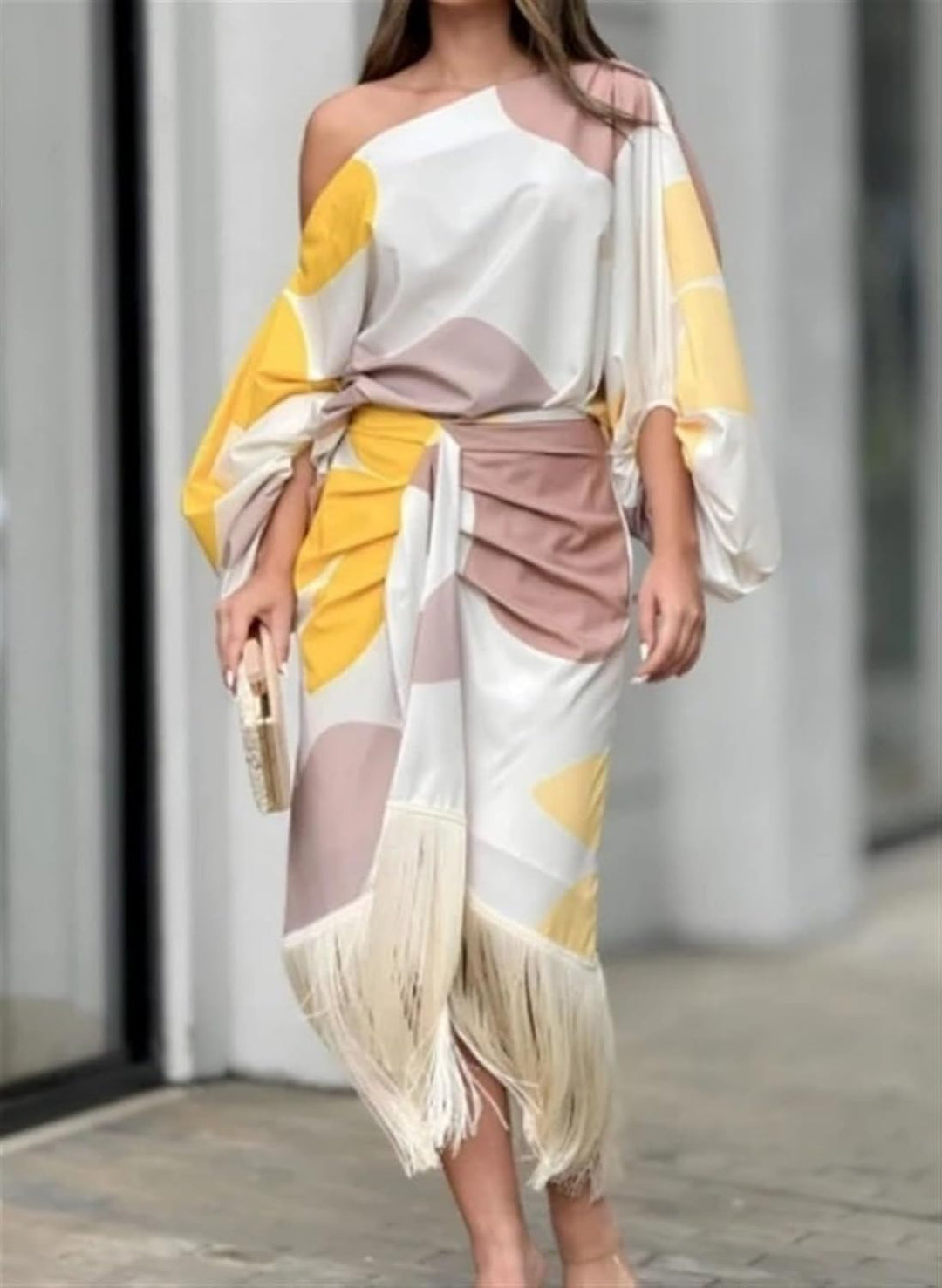 Women's elegant printed top & midi skirt duo set. Versatile two-piece outfit for stylish casual or dressy wear.