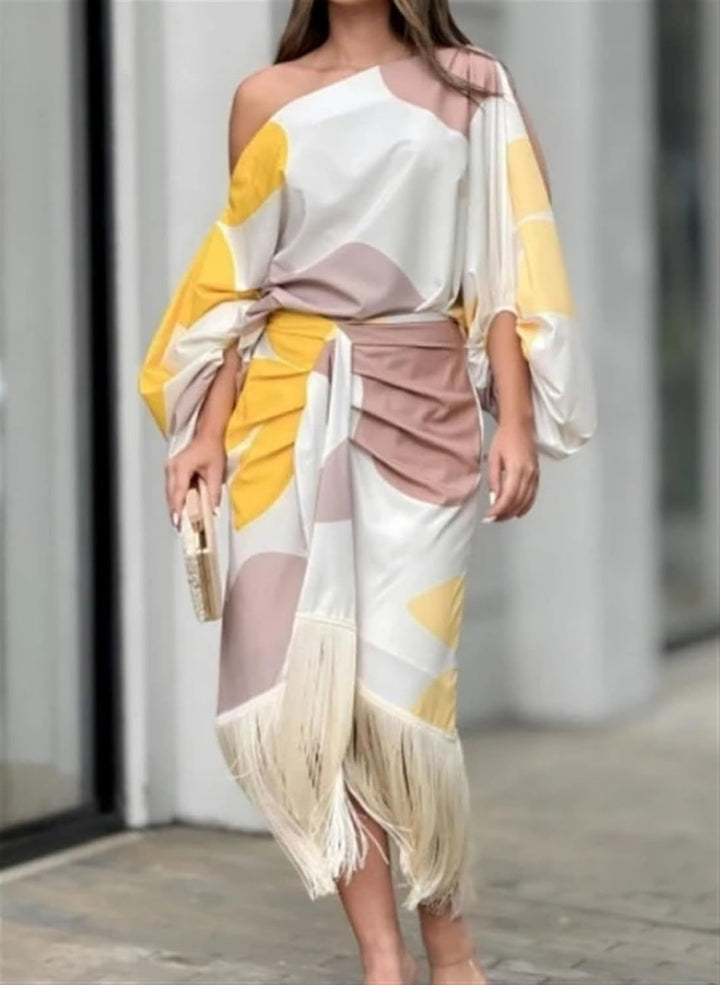 Women's elegant printed top & midi skirt duo set. Versatile two-piece outfit for stylish casual or dressy wear.