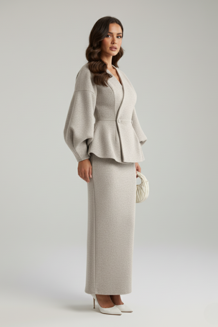 Chic women's co-ord set: puff sleeve blazer & midi skirt, perfect for wedding guests or elegant events.