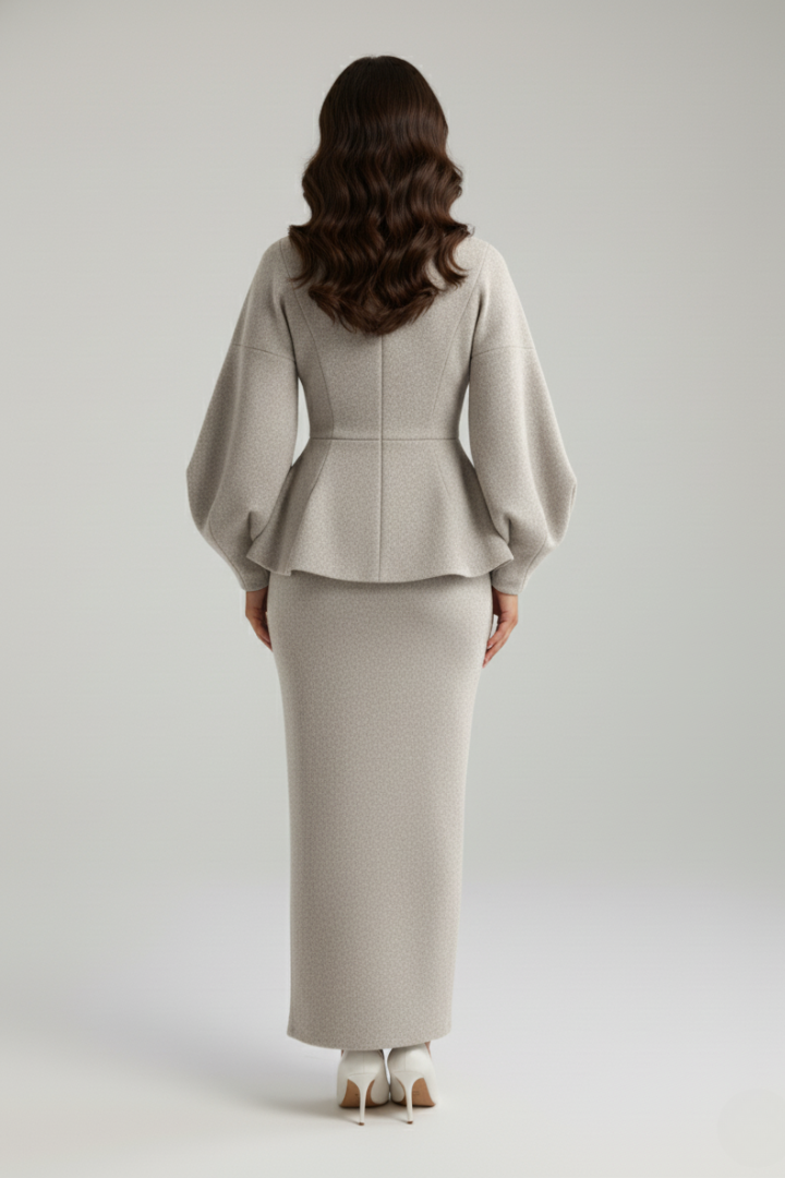 Sophisticated women's puff sleeve blazer and midi skirt co-ord set, a modern elegant two-piece outfit.