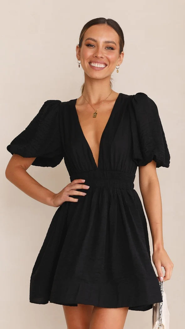 Stylish women's puff sleeve mini dress. Chic spring fashion, elegant and versatile for ladies' parties or daily wear.