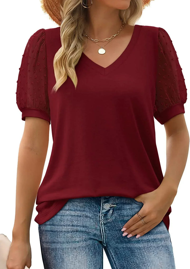 Elegant V-neck top for women with stylish puff sleeves, perfect for a refined look.