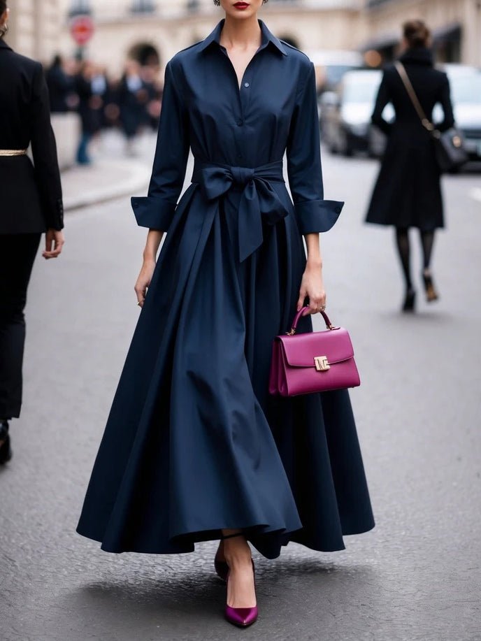 Stylish navy long sleeve tie-waist shirt dress for women. A comfortable and versatile maxi dress for any occasion.