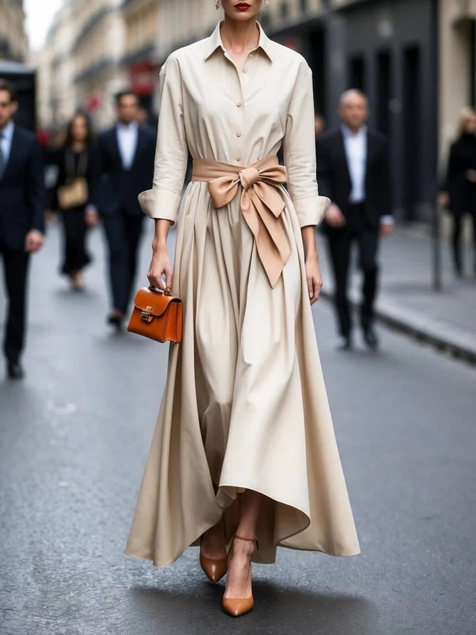Beige women's tie-waist shirt maxi dress, featuring elegant long sleeves & a flattering tie-waist for a polished look.