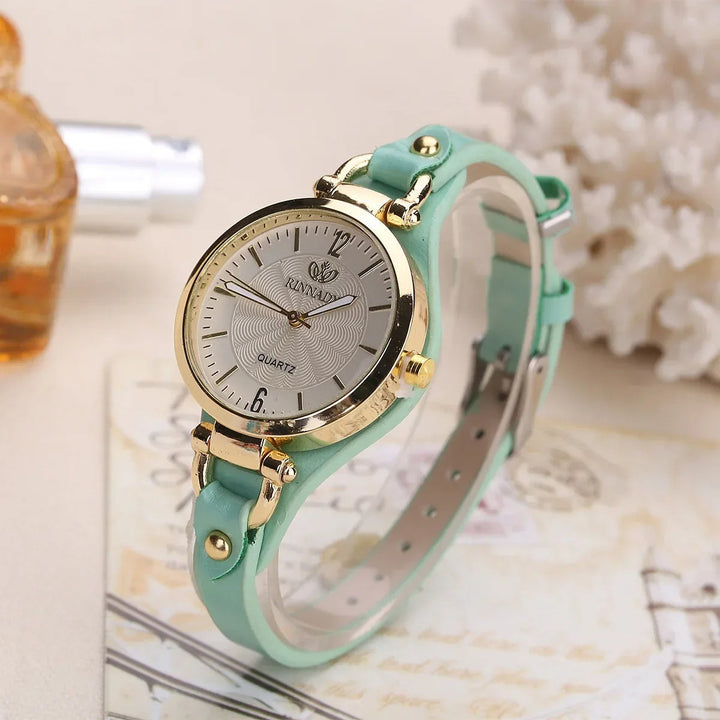 Chic women's accessory: a quartz timepiece with a beautiful engraved dial and durable vegan leather strap.