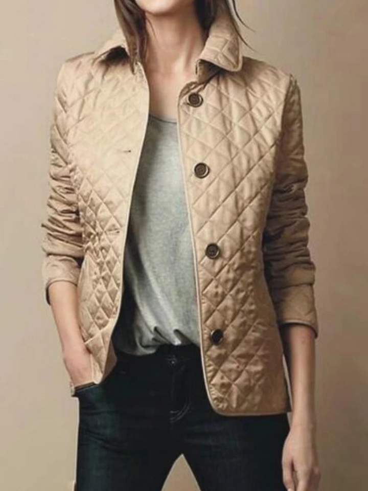 Women's plus size quilted jacket, elegant & comfortable with a classic turned-down collar. Ideal fall fashion piece.