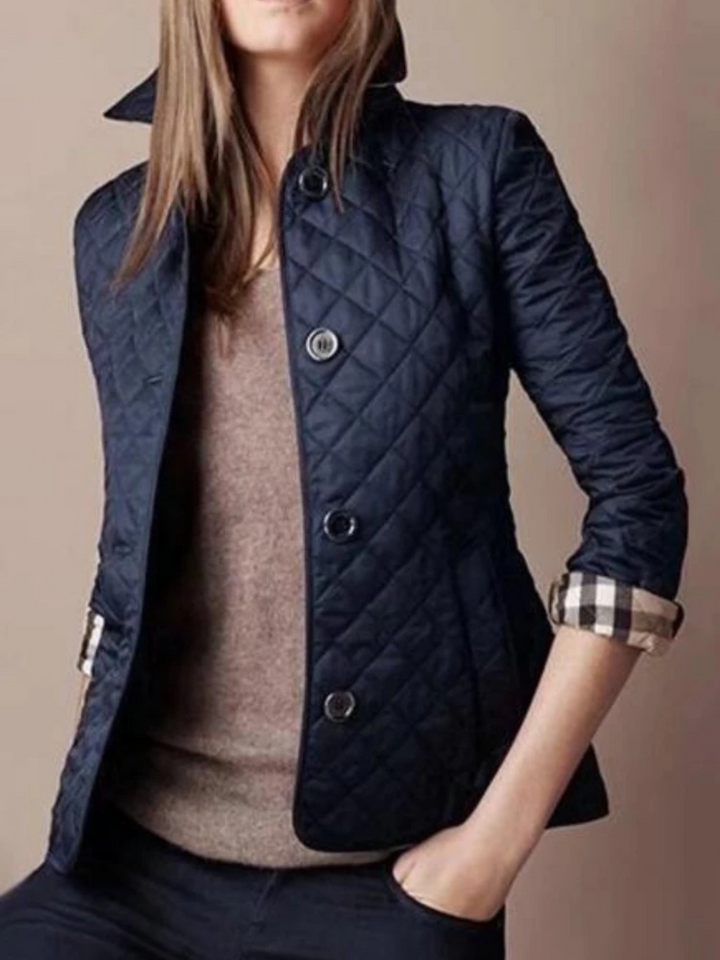 Elegant yet casual women's quilted jacket, classic turned-down collar & snap buttons. Perfect fall & winter style.