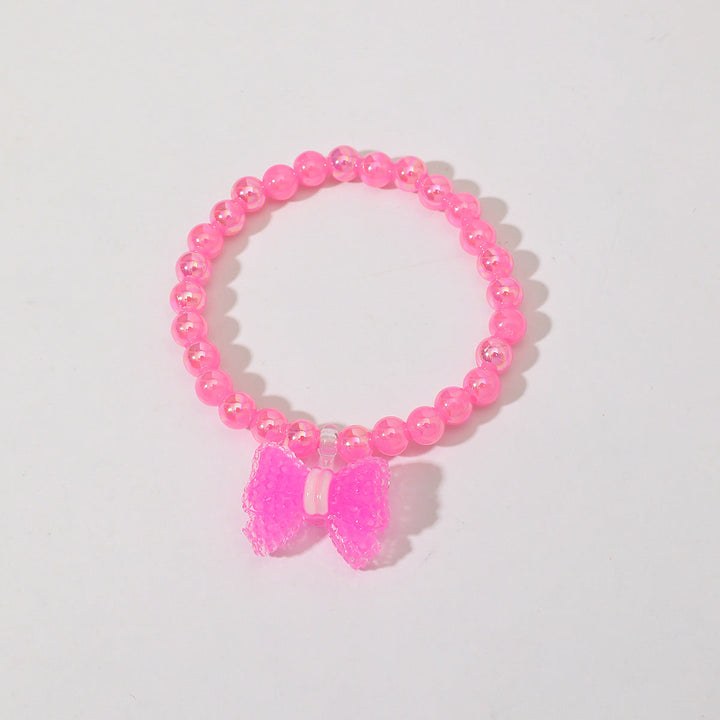 Fashionable red bead bracelet with an elegant heart charm, a must-have for women.