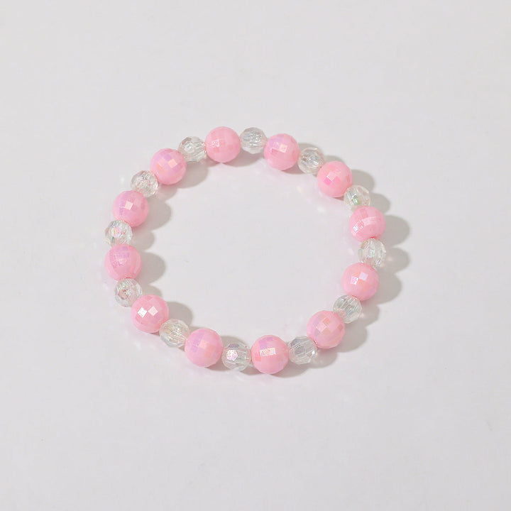 Women's elegant red bead bracelet with a charming heart accent, a perfect fashion statement.