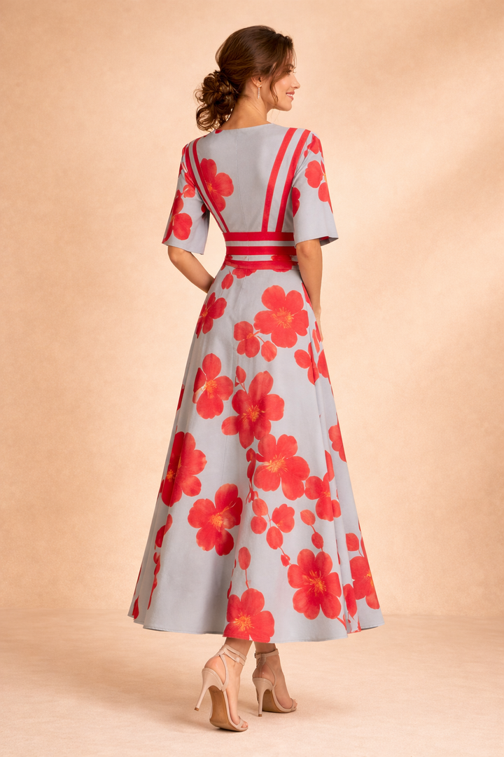 Stunning red maxi dress for women, featuring elegant design and a timeless silhouette.