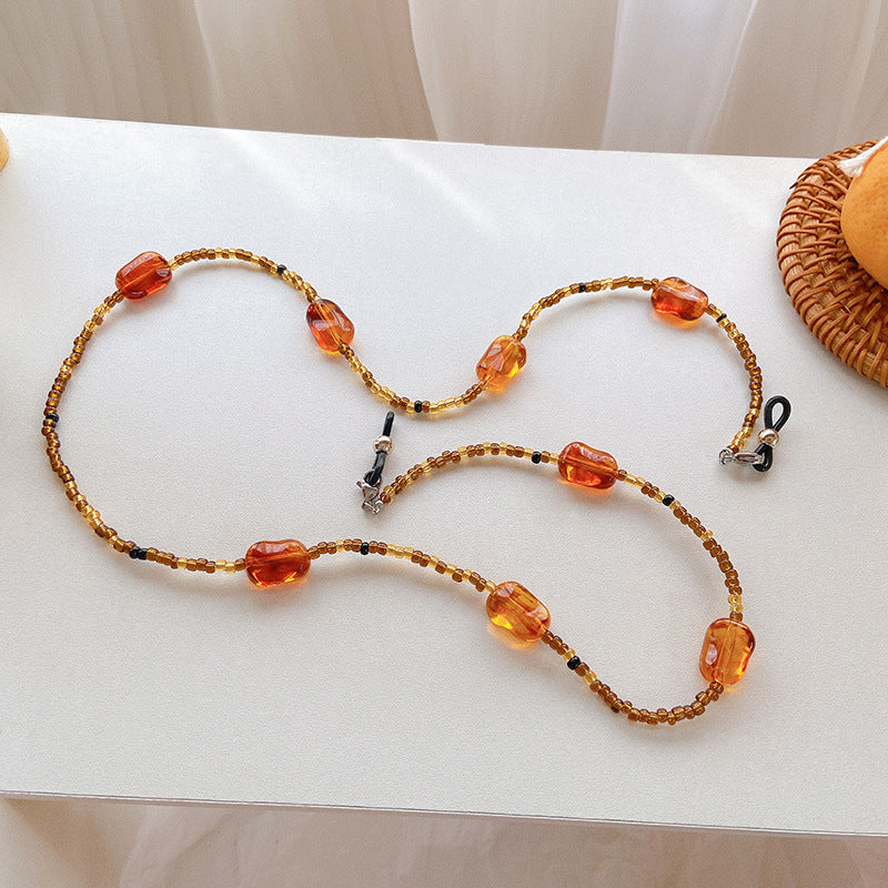 Women's fashion jewelry band featuring colorful resin beads, stylish and elegant bracelet design.