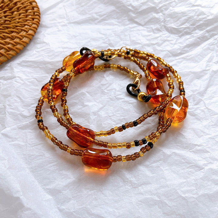Vibrant resin beaded jewelry band for women, a modern and elegant accessory with a unique design.