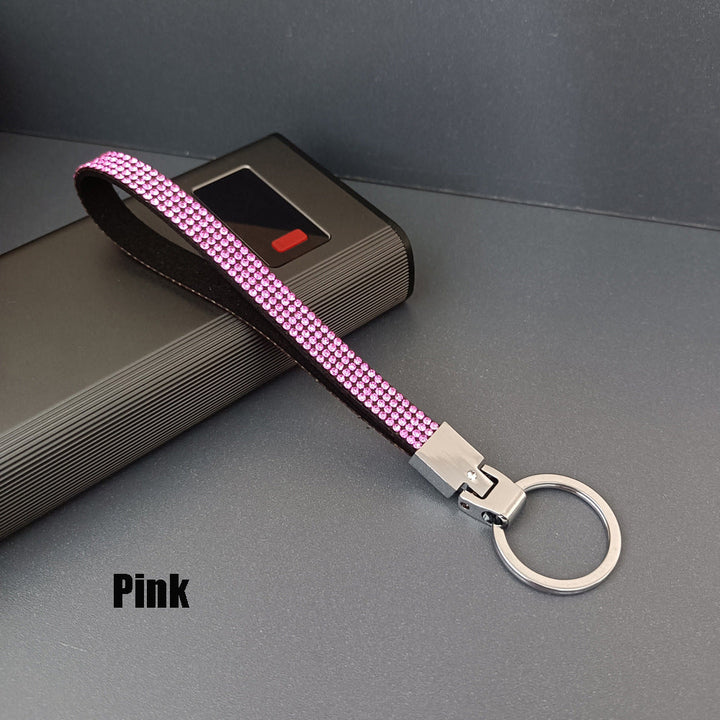 Stylish women's rhinestone key holder strap, perfect for keys or as a bag charm.
