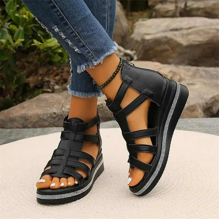 Elegant women's slip-on wedge sandals with rhinestone straps, a summer fashion essential.