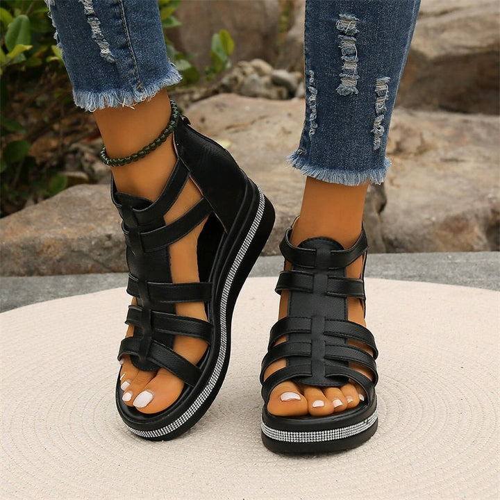 Fashionable women's footwear: rhinestone-adorned wedge sandals for casual or party comfort.