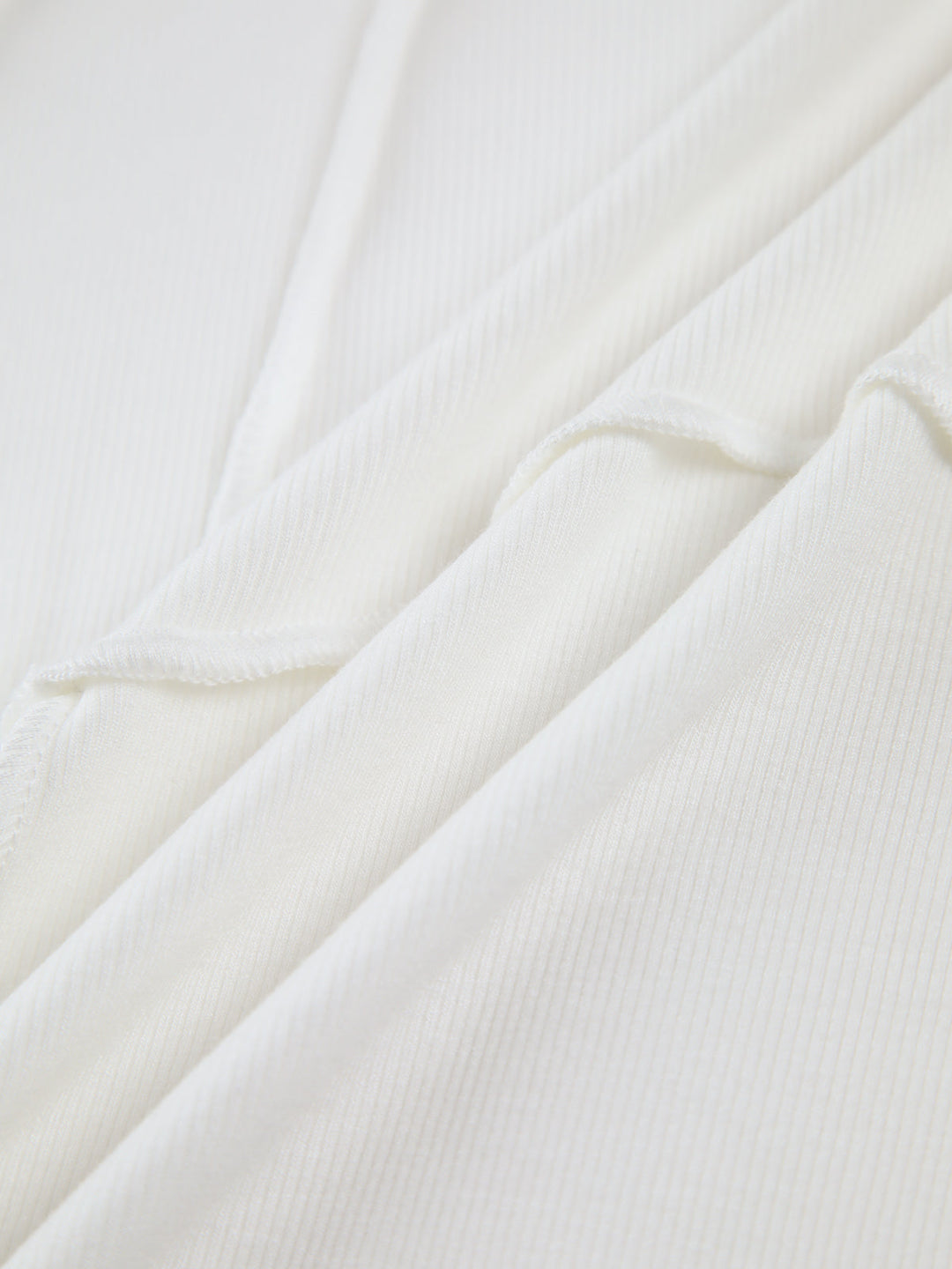 Women's elegant ribbed top, slim fit, long sleeve. Flattering seams enhance this versatile casual t-shirt.