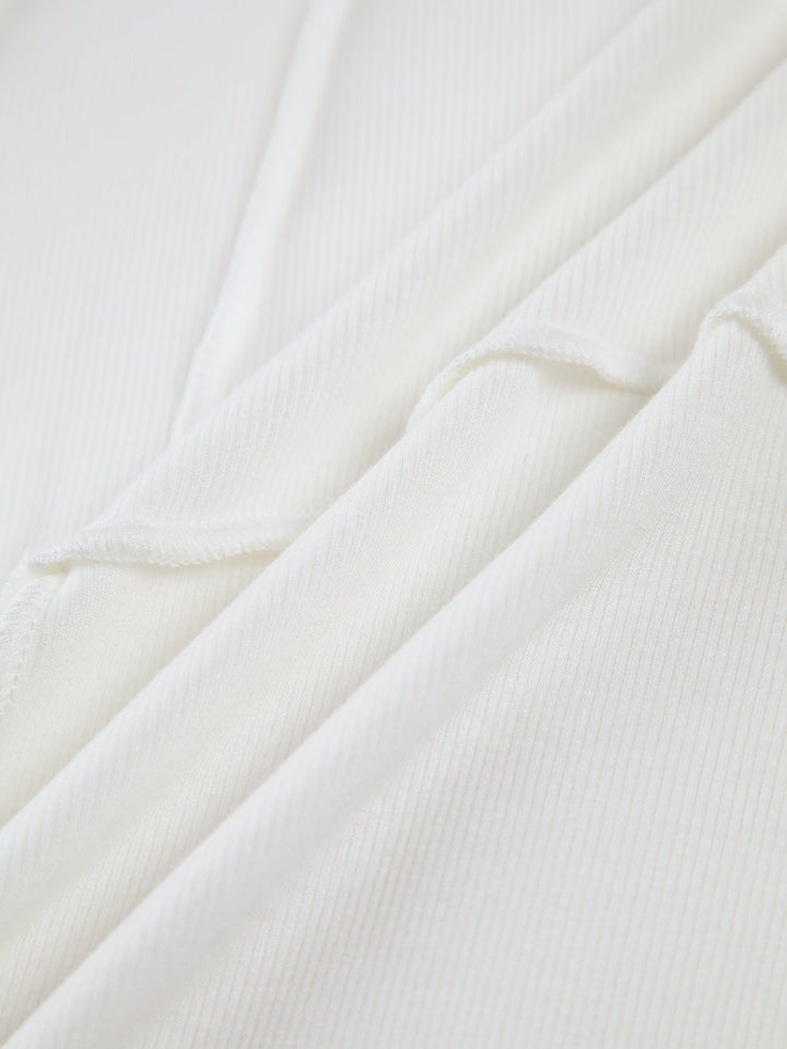 Women's elegant ribbed top, slim fit, long sleeve. Flattering seams enhance this versatile casual t-shirt.