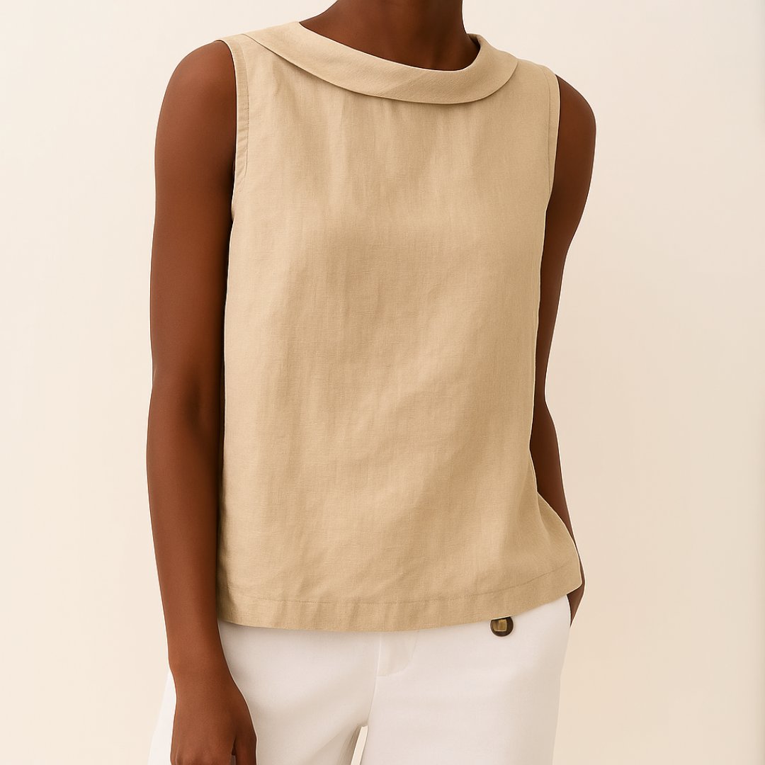 Chic sleeveless roll neck top for women. Elegant, smart casual blouse with a relaxed fit for versatile styling.