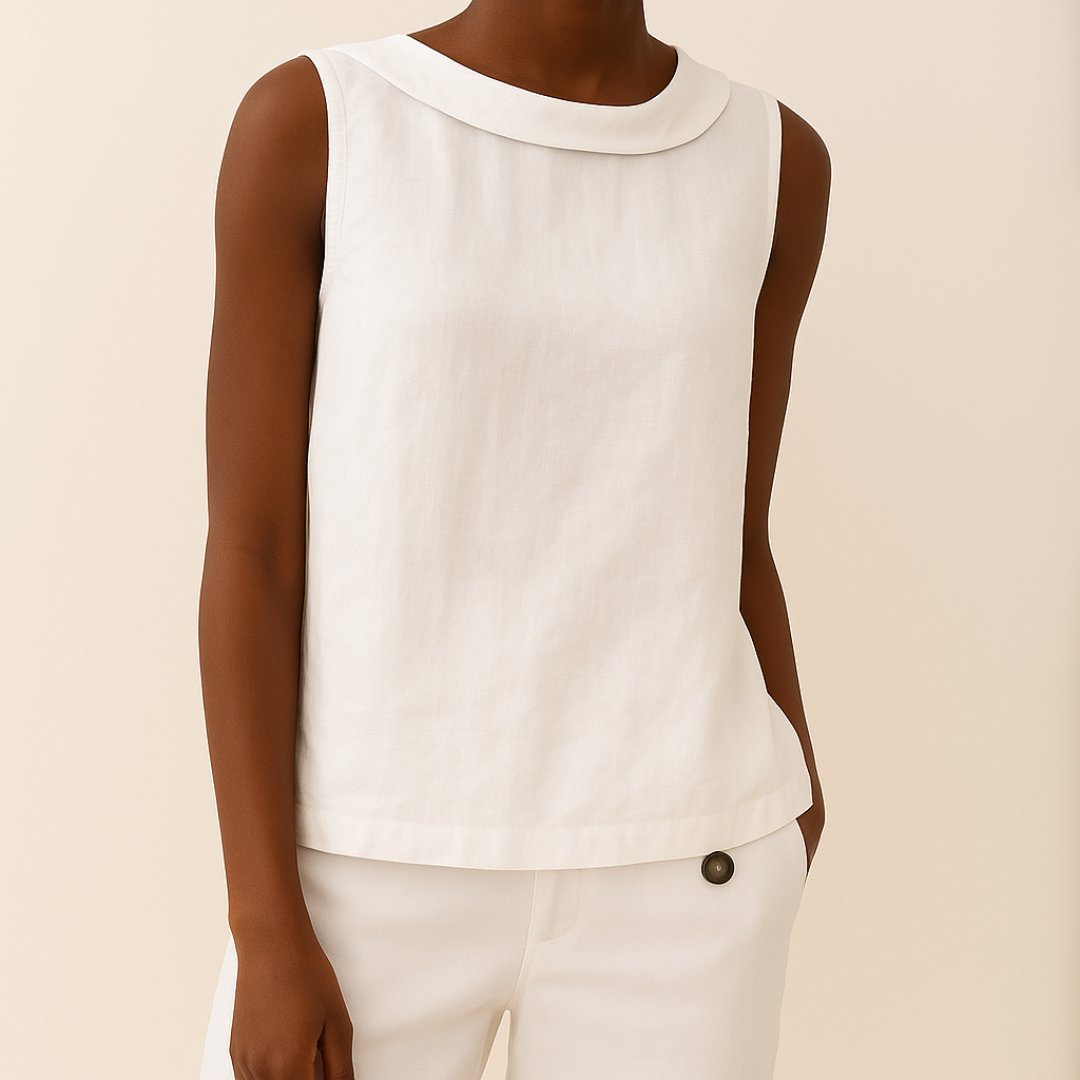 Smart casual women's sleeveless blouse featuring a stylish roll neck. Perfect for versatile summer wear.