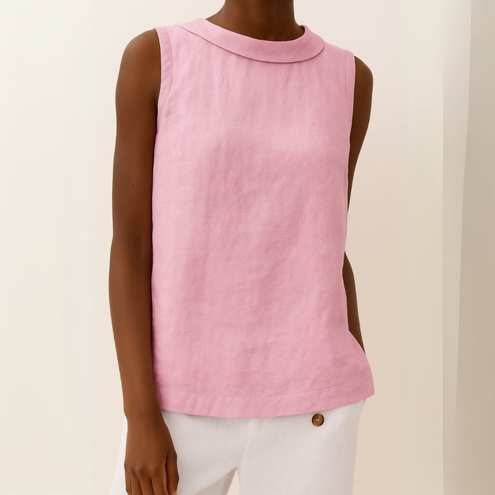 Sleeveless roll neck blouse for women, an elegant and versatile top for work or relaxed daytime wear.