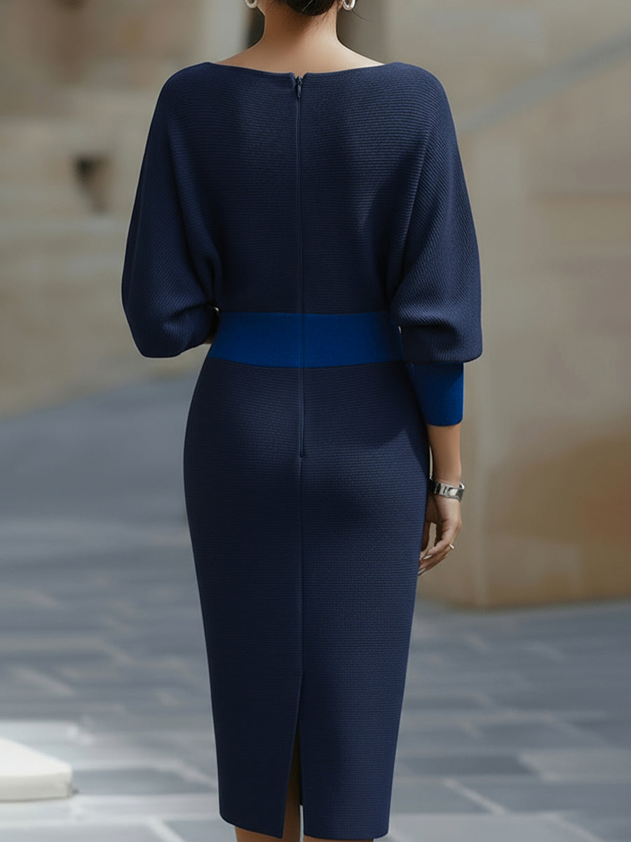 Beautiful women's elegant midi dress. Round neck, batwing sleeves. Perfect for chic occasion wear.