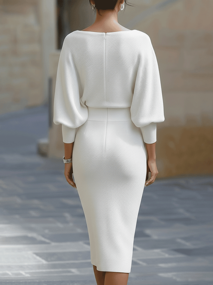 Comfortable women's round neck midi dress, elegant design with batwing sleeves. Perfect casual wear.