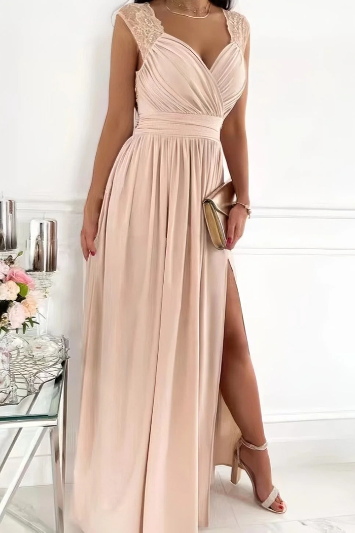Elegant women's ruched maxi dress with high slit and cap sleeves, perfect for evening or occasion wear.
